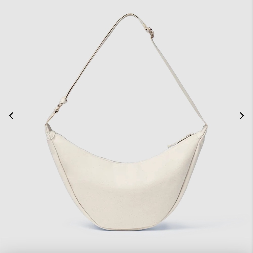 JULY everyday crescent bag in natural color new without tags